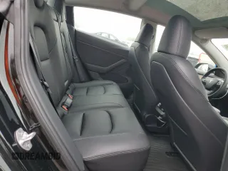 2023 Tesla Model 3 with VIN 5YJ3E1EA9PF687187, listed as a Copart auction lot 61044055 with 7,007 mi miles and Salvage title. Bid and sale history available at DreamBid. Image 10.