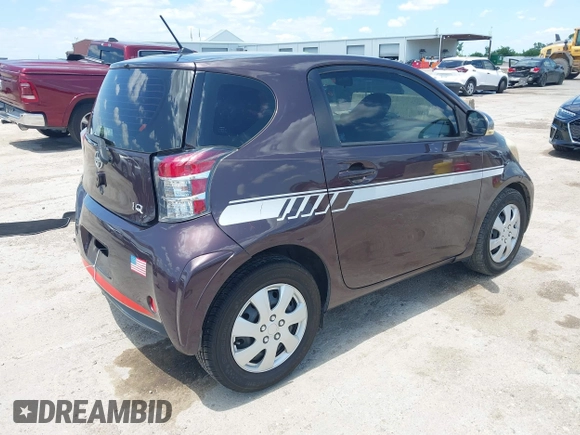 2012 Scion iQ with VIN JTNJJXB0XCJ021245, listed as a IAAI auction lot 42463167 with 158,901 mi miles and . Bid and sale history available at DreamBid. Image 4.
