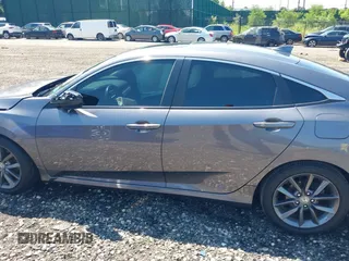 2020 Honda Civic EX-L with VIN 19XFC1F71LE201736, listed as a IAAI auction lot 39805242 with 47,132 mi miles and . Bid and sale history available at DreamBid. Image 14.