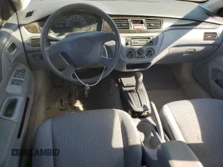 2003 Mitsubishi Lancer ES with VIN JA3AJ26E43U065588, listed as a Copart auction lot 77597304 with 108,665 mi miles and Salvage Title. Bid and sale history available at carsss.com. Image 8.