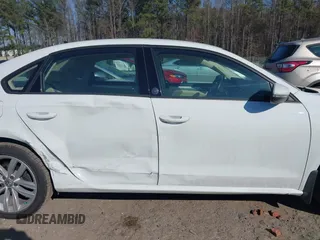 2019 Volkswagen Passat 2.0T Wolfsburg Edition with VIN 1VWLA7A32KC000818, listed as a IAAI auction lot 41711518 with 87,873 mi miles. Bid and sale history available at carsss.com. Image 13.
