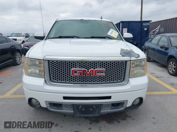2011 GMC Sierra 1500 Denali z VIN 3GTP2XE25BG404518, wystawiony jako IAAI lot #41504566 z przebiegiem 187 926 mil mil oraz . Historia ofert i sprzedaży dostępna na DreamBid. Obrazek 12.
