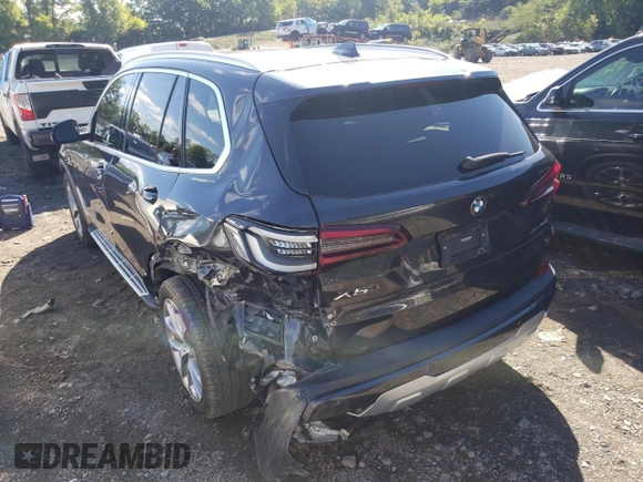 2020 BMW X5 xDrive40i with VIN 5UXCR6C05L9C58078, listed as a Copart auction lot 58996372 with 30,714 mi miles. Bid and sale history available at carsss.com. Image 3.