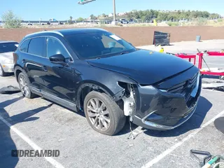 2017 Mazda CX-9 Grand Touring with VIN JM3TCBDY0H0130671, listed as a IAAI auction lot 42514237 with 81,016 mi miles and . Bid and sale history available at DreamBid. Image 1.