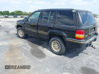 1995 Jeep Grand Cherokee Limited with VIN 1J4GZ78Y0SC578277, listed as a IAAI auction lot 42082848 with 174,288 mi miles. Bid and sale history available at carsss.com. Image 3.