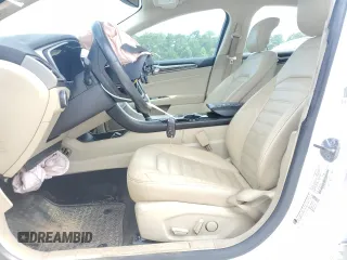 2014 Ford Fusion SE Hybrid with VIN 3FA6P0LU4ER363094, listed as a Copart auction lot 63460005 with 146,925 mi miles and Clean title. Bid and sale history available at DreamBid. Image 7.