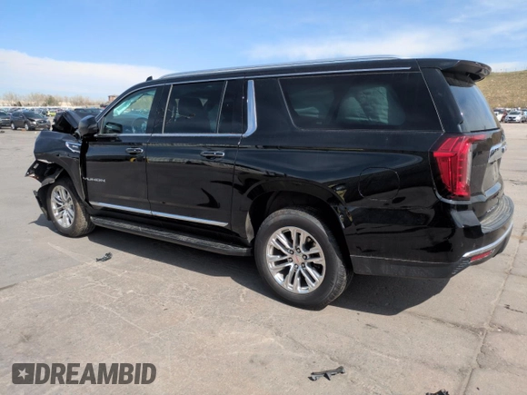 2023 GMC Yukon XL SLT z VIN 1GKS2GKD3PR282110, wystawiony jako Copart lot #52950425 z przebiegiem 99 147 mil mil oraz Szkoda całkowita • Salvage title. Historia ofert i sprzedaży dostępna na DreamBid. Obrazek 2.