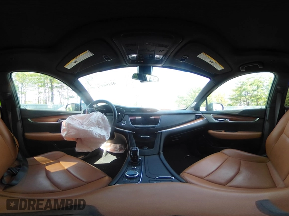 2021 Cadillac XT5 AWD Premium Luxury z VIN 1GYKNDRS8MZ217572, wystawiony jako IAAI lot #42190571 z przebiegiem 25 100 mil mil oraz . Historia ofert i sprzedaży dostępna na DreamBid. Obrazek 18.