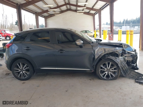 2017 Mazda CX-3 Grand Touring with VIN JM1DKFD70H0150496, listed as a IAAI auction lot 41746038 with 108,091 mi miles. Bid and sale history available at carsss.com. Image 14.