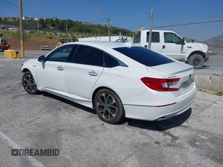2021 Honda Accord Touring with VIN 1HGCV3F95MA000714, listed as a IAAI auction lot 42350127 with 69,731 mi miles and . Bid and sale history available at DreamBid. Image 3.