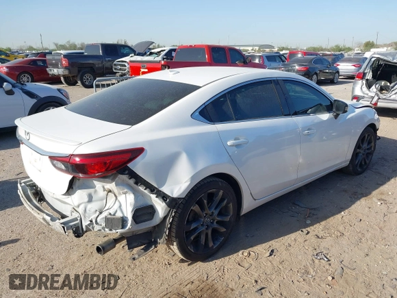 2016 Mazda Mazda6 i Grand Touring with VIN JM1GJ1W54G1456737, listed as a IAAI auction lot 41841001 with 114,870 mi miles. Bid and sale history available at carsss.com. Image 4.
