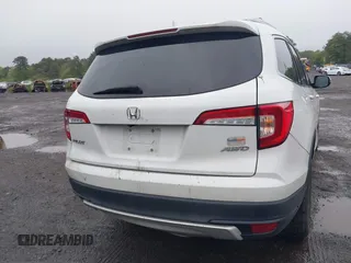 2020 Honda Pilot EX z VIN 5FNYF6H36LB027308, wystawiony jako IAAI lot #42216410 z przebiegiem 97 303 mil mil oraz . Historia ofert i sprzedaży dostępna na DreamBid. Obrazek 16.