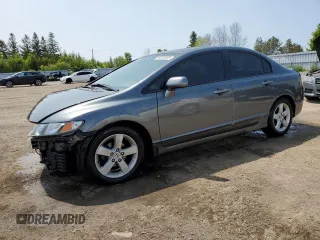 2010 Honda Civic LX-S z VIN 2HGFA1F62AH015431, wystawiony jako Copart lot #59226035 z przebiegiem 151 615 mil mil oraz Czysty tytuł • Clean title. Historia ofert i sprzedaży dostępna na DreamBid. Obrazek 1.