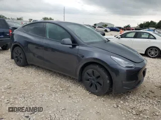 2024 Tesla Model Y with VIN 7SAYGDEDXRA322676, listed as a Copart auction lot 55664125 with 8,788 mi miles and Clean title. Bid and sale history available at DreamBid. Image 4.