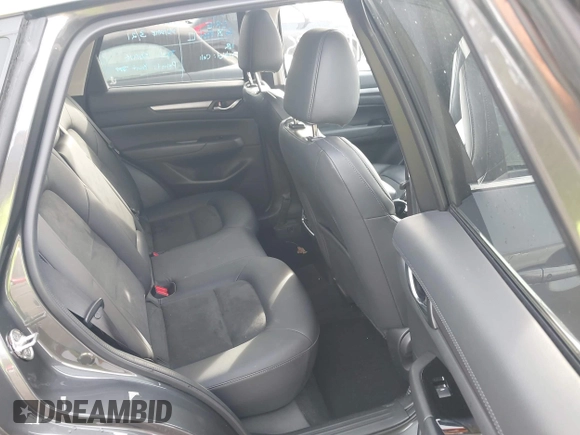 2020 Mazda CX-5 Touring with VIN JM3KFBCM8L0863951, listed as a IAAI auction lot 41921635 with 88,629 mi miles. Bid and sale history available at carsss.com. Image 8.