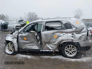 2015 Kia Sorento LX with VIN 5XYKT4A65FG595831, listed as a IAAI auction lot 42032576 with 160,000 mi miles and . Bid and sale history available at carsss.com. Image 14.