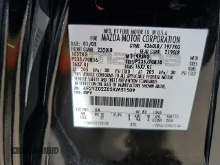 2005 Mazda Tribute i with VIN 4F2YZ02Z05KM51509, listed as a Copart auction lot 75985994 with Not Provided miles and Salvage Title. Bid and sale history available at carsss.com. Image 14.