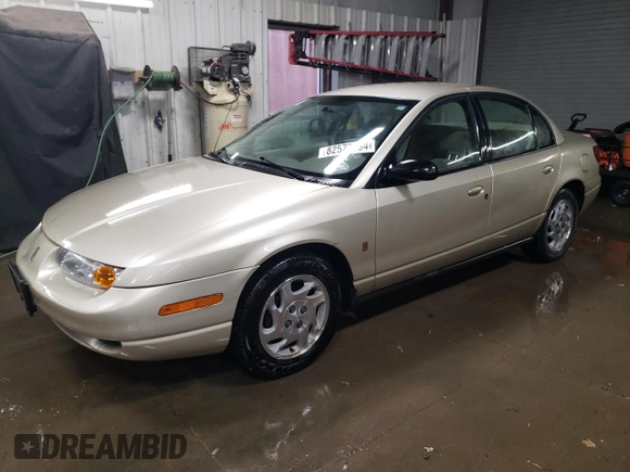 2000 Saturn SL with VIN 1G8ZK5278YZ269342, listed as a Copart auction lot 82573694 with 53,641 mi miles and Salvage title. Bid and sale history available at DreamBid. Image 1.