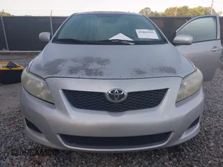 2010 Toyota Corolla with VIN 1NXBU4EE6AZ320115, listed as a IAAI auction lot 42069282 with 183,905 mi miles. Bid and sale history available at carsss.com. Image 6.