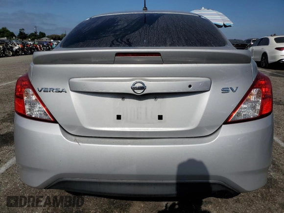 2016 Nissan Versa SV with VIN 3N1CN7AP5GL910813, listed as a Copart auction lot 61952495 with 58,542 mi miles and Salvage title. Bid and sale history available at DreamBid. Image 6.