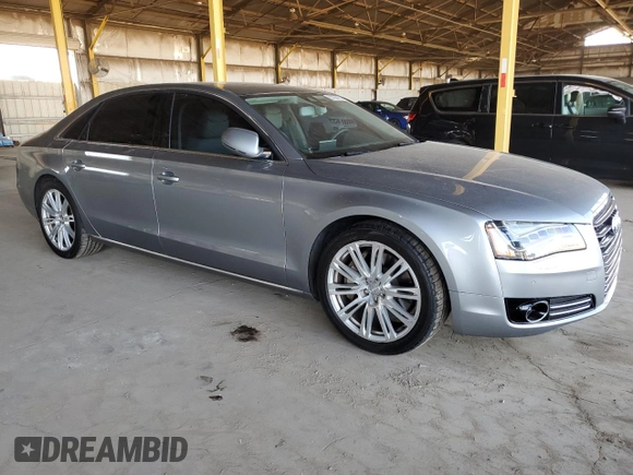 2012 Audi A8 with VIN WAURVAFD0CN028037, listed as a Copart auction lot 61004815 with 97,424 mi miles and Salvage title. Bid and sale history available at DreamBid. Image 4.