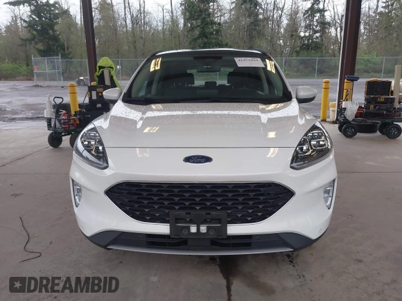 2020 Ford Escape Titanium Hybrid z VIN 1FMCU9DZ8LUA58350, wystawiony jako IAAI lot #41975564 z przebiegiem 38 387 mil mil oraz . Historia ofert i sprzedaży dostępna na DreamBid. Obrazek 12.