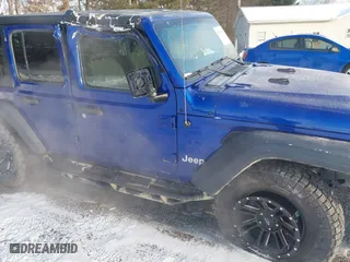 2018 Jeep Wrangler Unlimited Sport S with VIN 1C4HJXDNXJW265764, listed as a IAAI auction lot 41359018 with 50,941 mi miles. Bid and sale history available at carsss.com. Image 6.
