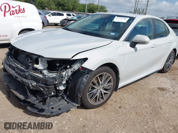 2023 Toyota Camry SE z VIN 4T1T11AK1PU159799, wystawiony jako IAAI lot #42517586 z przebiegiem 51 245 mil mil oraz . Historia ofert i sprzedaży dostępna na DreamBid. Obrazek 17.