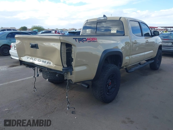2017 Toyota Tacoma SR5 with VIN 3TMDZ5BN5HM020766, listed as a IAAI auction lot 41778367 with 100,048 mi miles. Bid and sale history available at carsss.com. Image 4.