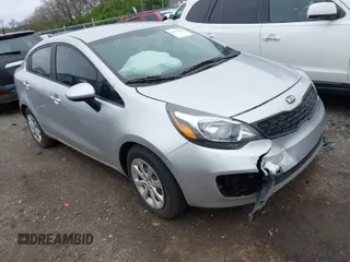 2015 Kia Rio LX with VIN KNADM4A34F6454499, listed as a IAAI auction lot 41919110 with 149,706 mi miles. Bid and sale history available at carsss.com. Image 1.