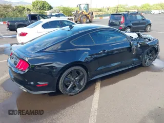 2021 Ford Mustang GT z VIN 1FA6P8CF1M5147740, wystawiony jako IAAI lot #38920487 z przebiegiem 15 299 mil mil oraz . Historia ofert i sprzedaży dostępna na DreamBid. Obrazek 4.