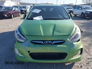 2014 Hyundai Accent SE z VIN KMHCU5AEXEU175389, wystawiony jako IAAI lot #42067176 z przebiegiem 124 741 mil mil oraz . Historia ofert i sprzedaży dostępna na DreamBid. Obrazek 12.