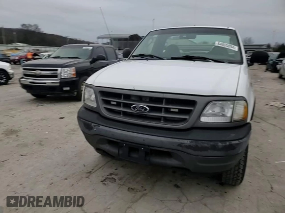 2003 Ford F-150 XL with VIN 1FTRF18W03NA77544, listed as a Copart auction lot 84805894 with Not provided miles and Salvage title. Bid and sale history available at DreamBid. Image 11.