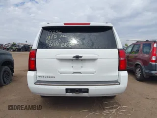 2015 Chevrolet Suburban LTZ with VIN 1GNSKKKC5FR691219, listed as a IAAI auction lot 41921973 with 169,119 mi miles and . Bid and sale history available at DreamBid. Image 16.