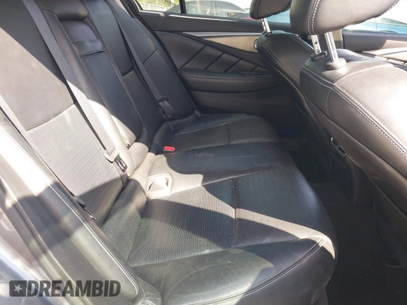 2014 Infiniti Q50 Sport with VIN JN1BV7AP4EM670443, listed as a IAAI auction lot 41801219 with 98,719 mi miles and . Bid and sale history available at DreamBid. Image 8.