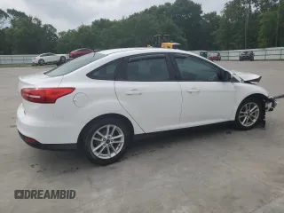 2015 Ford Focus SE with VIN 1FADP3F21FL246821, listed as a Copart auction lot 59732635 with 135,752 mi miles and Salvage title. Bid and sale history available at DreamBid. Image 3.