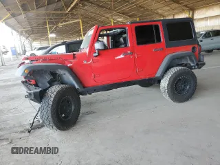 2012 Jeep Wrangler Unlimited Call of Duty MW3 with VIN 1C4BJWFGXCL225459, listed as a Copart auction lot 60699895 with 98,196 mi miles and Salvage title. Bid and sale history available at DreamBid. Image 1.