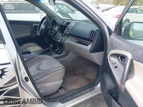 2006 Toyota RAV4 with VIN JTMZD33V165028969, listed as a IAAI auction lot 41850621 with 257,739 mi miles. Bid and sale history available at carsss.com. Image 5.