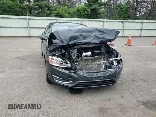 2014 Volvo S60 T5 z VIN YV1612FS9E2275447, wystawiony jako Copart lot #59988845 z przebiegiem 117 805 mil mil oraz Szkoda całkowita • Salvage title. Historia ofert i sprzedaży dostępna na DreamBid. Obrazek 13.