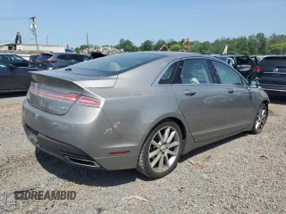 2016 Lincoln MKZ z VIN 3LN6L2J99GR620863, wystawiony jako Copart lot #59547725 z przebiegiem 121 607 mil mil oraz Szkoda całkowita • Salvage title. Historia ofert i sprzedaży dostępna na DreamBid. Obrazek 3.
