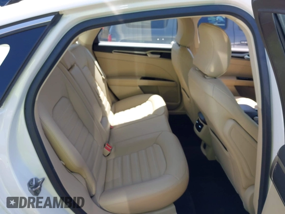 2016 Ford Fusion SE with VIN 3FA6P0HD1GR274241, listed as a IAAI auction lot 42113320 with 103,870 mi miles and . Bid and sale history available at DreamBid. Image 8.