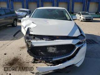 2020 Mazda CX-5 Touring with VIN JM3KFACM0L0770254, listed as a Copart auction lot 71066824 with 0 mi miles and Salvage Title. Bid and sale history available at carsss.com. Image 5.