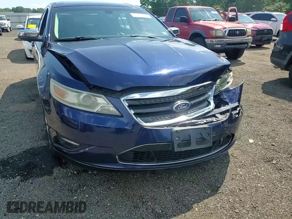 2011 Ford Taurus Limited with VIN 1FAHP2FW4BG135889, listed as a Copart auction lot 61493035 with 147,343 mi miles and Salvage title. Bid and sale history available at DreamBid. Image 13.