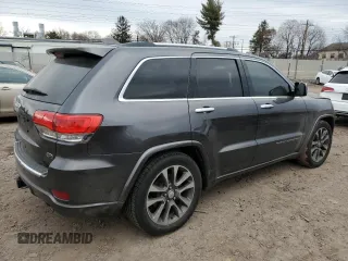 2017 Jeep Grand Cherokee Overland with VIN 1C4RJFCT5HC874593, listed as a Copart auction lot 46770205 with 72,744 mi miles and Salvage Title. Bid and sale history available at carsss.com. Image 3.
