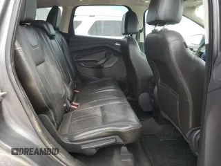 2013 Ford Escape Titanium z VIN 1FMCU9J90DUA72264, wystawiony jako Copart lot #49906445 z przebiegiem 126 527 mil mil oraz Szkoda całkowita • Salvage title. Historia ofert i sprzedaży dostępna na DreamBid. Obrazek 11.