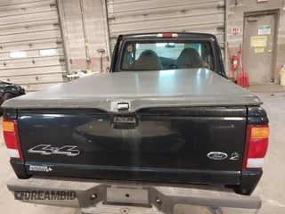1999 Ford Ranger XL with VIN 1FTZR15V4XPB56809, listed as a IAAI auction lot 41874991 with 165,487 mi miles. Bid and sale history available at carsss.com. Image 16.