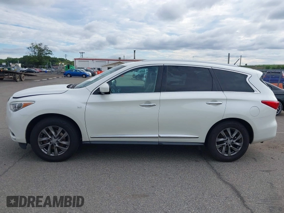 2015 Infiniti QX60 with VIN 5N1AL0MM3FC540132, listed as a IAAI auction lot 42760442 with 197,075 mi miles and . Bid and sale history available at DreamBid. Image 14.