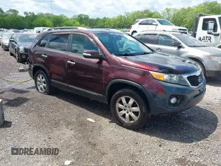2011 Kia Sorento LX with VIN 5XYKT4A13BG044196, listed as a IAAI auction lot 42080972 with 292,004 mi miles. Bid and sale history available at carsss.com. Image 1.