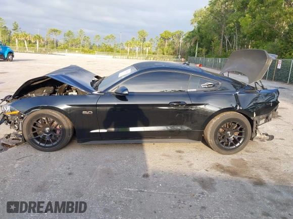 2021 Ford Mustang GT z VIN 1FA6P8CF5M5103885, wystawiony jako IAAI lot #42047874 z przebiegiem 58 521 mil mil oraz . Historia ofert i sprzedaży dostępna na DreamBid. Obrazek 15.