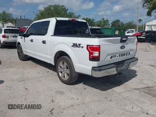 2018 Ford F-150 XL with VIN 1FTEW1CB8JFC47174, listed as a IAAI auction lot 41956391 with 148,337 mi miles. Bid and sale history available at carsss.com. Image 3.